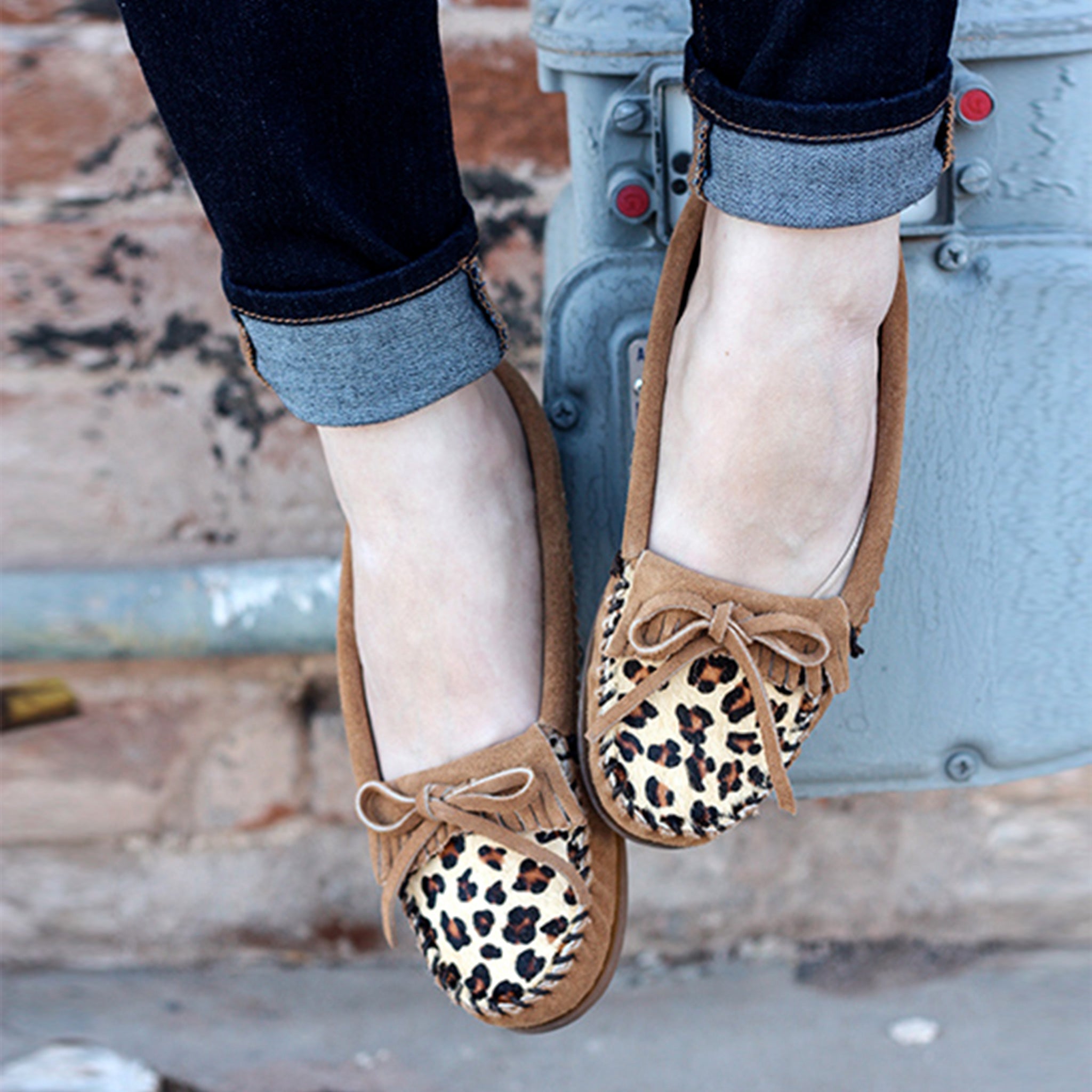 Minnetonka full leopard moccasins on sale